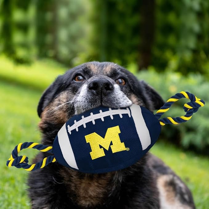 Pets First NCAA Michigan Wolverines Football Dog Toy, Tough Quality Nylon Materials, Strong Pull Ropes, Inner Squeaker, Collegiate Team Color, 1 Count (Pack of 1)
