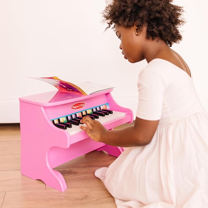 Melissa & Doug Learn-to-Play Pink Piano With 25 Keys and Color-Coded Songbook