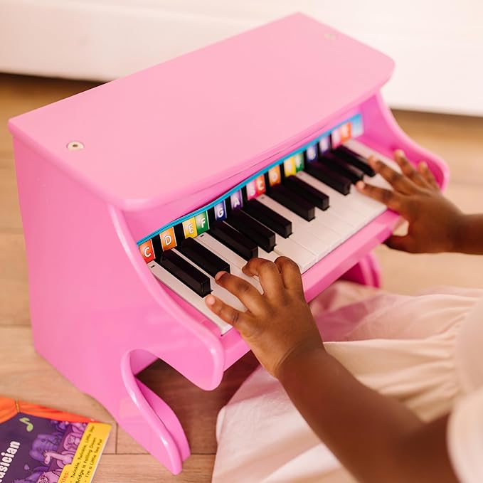 Melissa & Doug Learn-to-Play Pink Piano With 25 Keys and Color-Coded Songbook