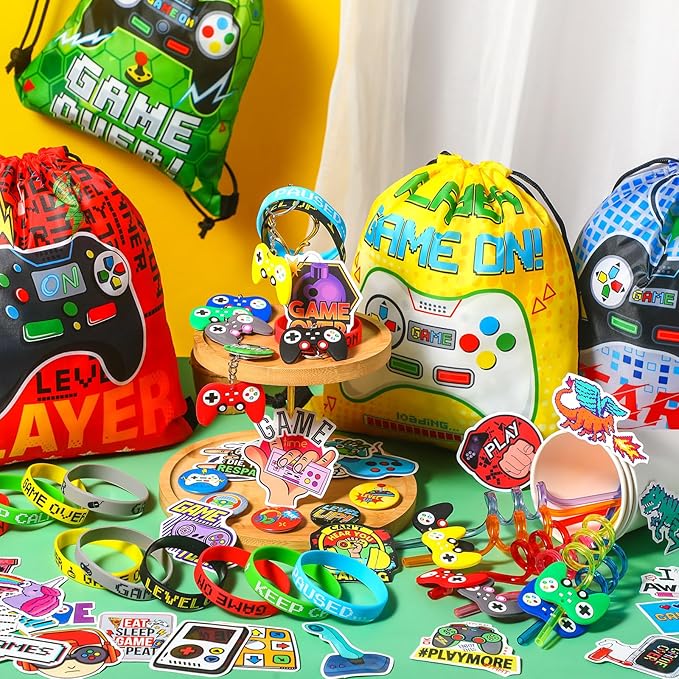 Sadnyy 140 Pcs Video Game Party Favors Birthday Party Decorations Supplies Drawstring Bags with Silicone Bracelets Keychains Straws Button Pins Stickers for Classroom Rewards Goodie Bags Stuffers