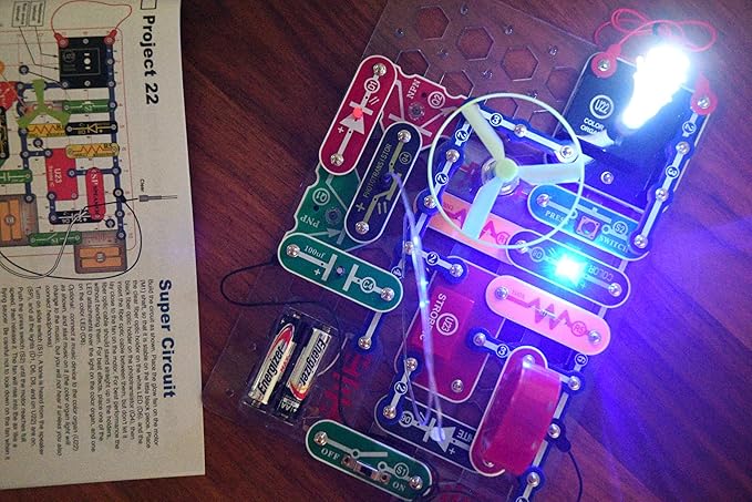 Snap Circuits LIGHT Electronics Exploration Kit | Over 175 Exciting STEM Projects | Full Color Project Manual | 55+ Snap Circuits Parts | STEM Educational Toys for Kids 8+,Multi