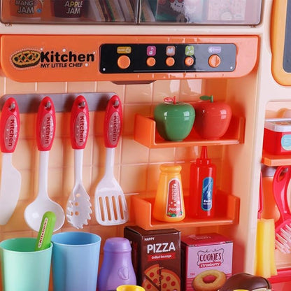 deAO My Happy Little Chef Kitchen 80 Pieces Pretend Play Set with Multi-Functional Button Panel, Light, Sound, Real Steam Functions and Colour Changing Accessories Included(Pink)