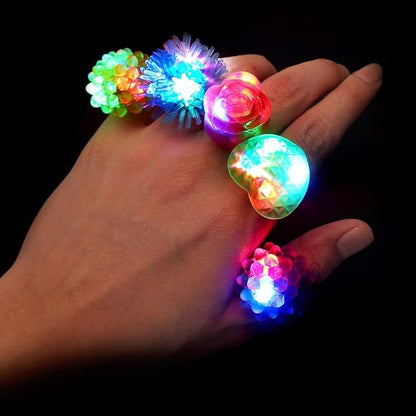 74 Pcs Light Up Toy Party Favors Glow in the Dark Party Supplies for Kid Adults with 44 Finger Lights 8 Jelly Rings 6 Glasses 4 Bracelets 4 Necklaces 4 Fiber Optic Hair Lights and 4 Spinning Top