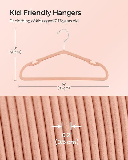SONGMICS Kids Hangers 50 Pack, 14 x 8 Inches, Baby Hangers for Closet, Non-Slip Velvet Hangers, Childrens Hangers, Space-Saving Clothes Hangers, Wide Shoulder Notches, Coral Pink UCRF038R01