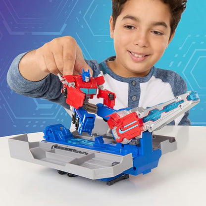 Transformers EarthSpark Optimus Prime Battle Trailer Playset with Action Figure, Lights and Sounds, Electronic Truck Toys for Kids 6 and Up