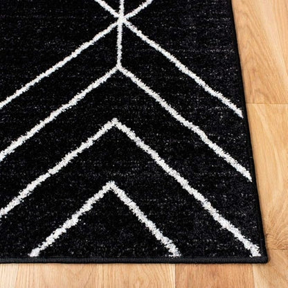 SAFAVIEH Adirondack Collection Accent Rug - 4' x 6', Black & Ivory, Modern Geometric Design, Non-Shedding & Easy Care, Ideal for High Traffic Areas in Entryway, Living Room, Bedroom (ADR241Z)