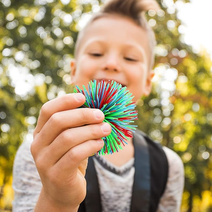 Leinuosen 12 Pieces Stringy Balls Sensory Stringy Ball End of Year Gifts Soft Rainbow Pom Bouncy Stress Bags Basket Stuffers Fillers Party Favors Birthday Gifts, Multicolor (2.75 Inch)