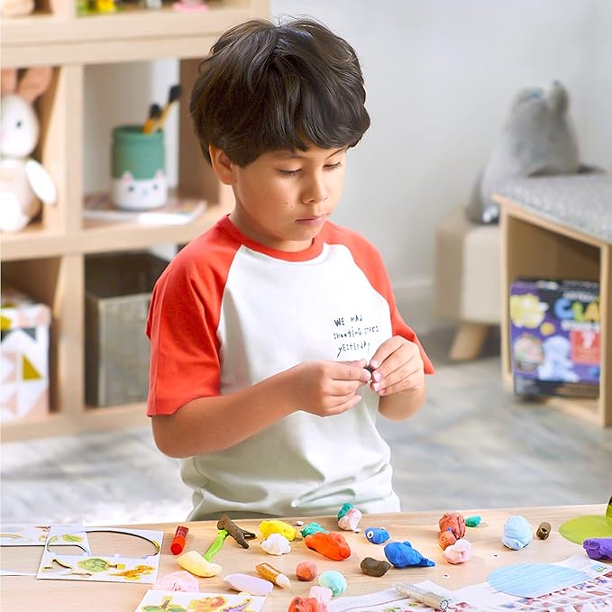 ARTEZA Kids Air Dry Clay, 42 Bars, Dinosaur Modeling Clay Kit, 14 Mini-Stages, 14 Googly Eyes, 3 Glitter Glues, 1 Craft Tool, 7 Instruction Sheets