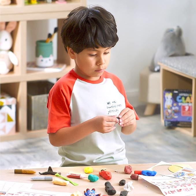 Arteza Kids Air Dry Clay, 42 Bars, Superhero Stage Modeling Clay Kit, 14 Mini-Stages, 14 Googly Eyes, 3 Glitter Glues, 1 Craft Tool, 7 Instruction Sheets, Craft Supplies for Learning and Developing