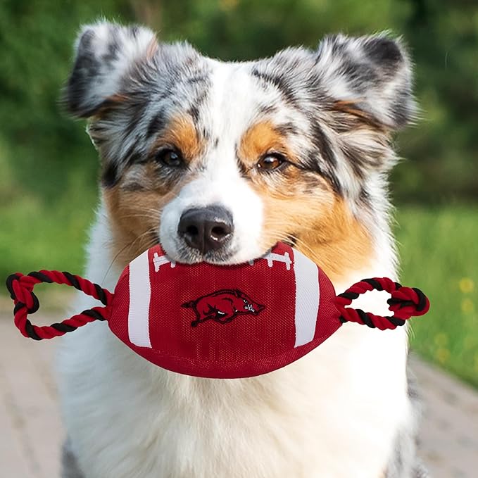 Pets First NCAA Arkansas Razorbacks Football Dog Toy, Tough Quality Nylon Materials, Strong Pull Ropes, Inner Squeaker, Collegiate Team Color