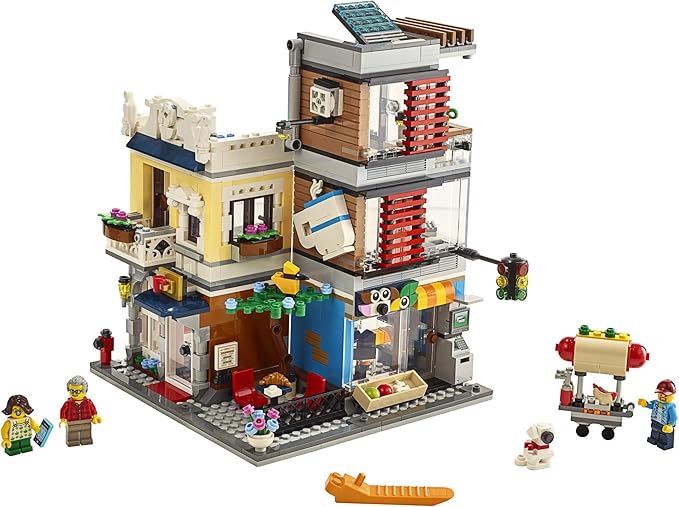 LEGO Creator 3 in 1 Townhouse Pet Shop & Café 31097 Toy Store Building Set with Bank, Town Playset with a Toy Tram, Animal Figures and Minifigures (969 Pieces)