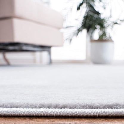 SAFAVIEH Carnegie Collection Runner Rug - 2'3" x 8', Light Grey & Grey, Vintage Distressed Design, Non-Shedding & Easy Care, Ideal for High Traffic Areas in Living Room, Bedroom (CNG691G)