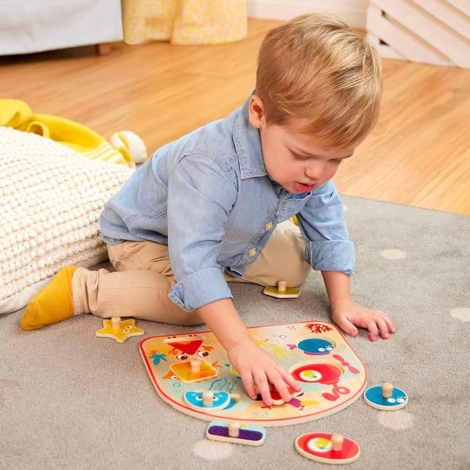 B. toys- Sea Treasures- Wooden Peg Puzzle – Sea Animals Puzzle – Ocean Peg Puzzle for Toddlers, Kids – 8 Chunky Pieces – 18 Months +