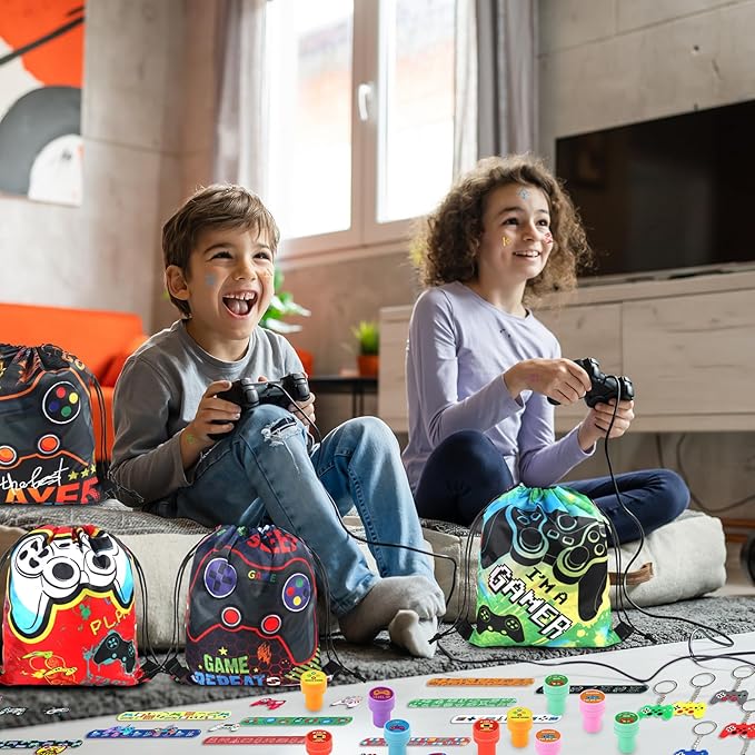 98 Pcs Video Game Party Favors Gifts Set Include Gamer Party Favor Stickers Stamps Keychains Slap Bracelets and Drawstring Bags Party Decorations for Kids Video Game Birthday Party Favors Supplies