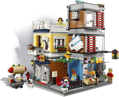 LEGO Creator 3 in 1 Townhouse Pet Shop & Café 31097 Toy Store Building Set with Bank, Town Playset with a Toy Tram, Animal Figures and Minifigures (969 Pieces)