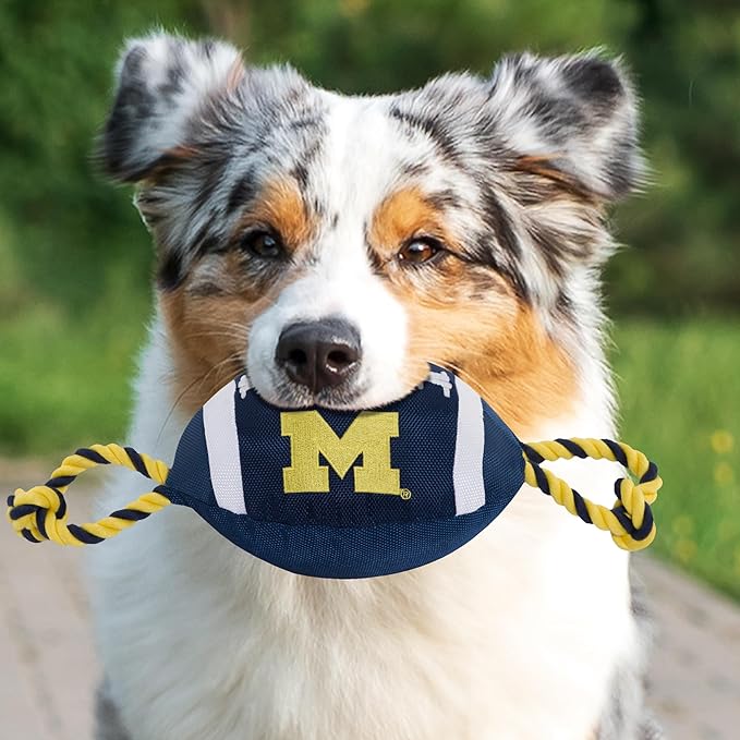 Pets First NCAA Michigan Wolverines Football Dog Toy, Tough Quality Nylon Materials, Strong Pull Ropes, Inner Squeaker, Collegiate Team Color, 1 Count (Pack of 1)