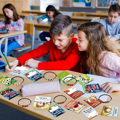 ANGOLIO 56Pcs Valentine's Day Cards for Kids with Ball Sport Bracelets, Valentine Exchange Gifts Classroom with Football Basketball Bracelets, School Friends Exchange Gift Party Favors for Girls Boys