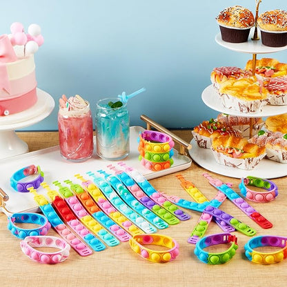 JOYIN Pop Fidget Toys pops Bulk 50 Pack Party Favors for Kids 4-8,8-12 Year, Fidget Bracelets Sensory Toys for Birthday Carnival School Prizes Gifts Goodie Bags Stuffers for Kids, Treasure Box Toys