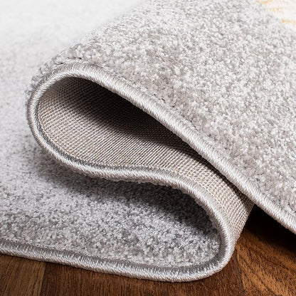 SAFAVIEH Carousel Kids Collection Area Rug - 6'7" x 9', Grey & Ivory, Elephant Design, Non-Shedding & Easy Care, Ideal for High Traffic Areas for Boys & Girls in Playroom, Nursery, Bedroom (CRK165B)