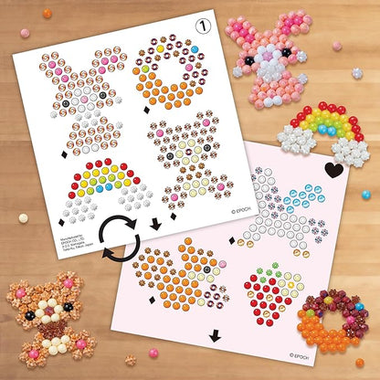 Aquabeads - L'atelier d'initiation - Kit de loisirs créatifs - Activité manuelle Enfants en Toute autonomie - Coffret de perles qui collent Avec de l'eau - Jouet Enfant 4 ans et + - 35087