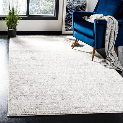 SAFAVIEH Adirondack Collection Accent Rug - 4' x 6', Ivory & Navy, Moroccan Boho Distressed Design, Non-Shedding & Easy Care, Ideal for High Traffic Areas in Entryway, Living Room, Bedroom (ADR119M)