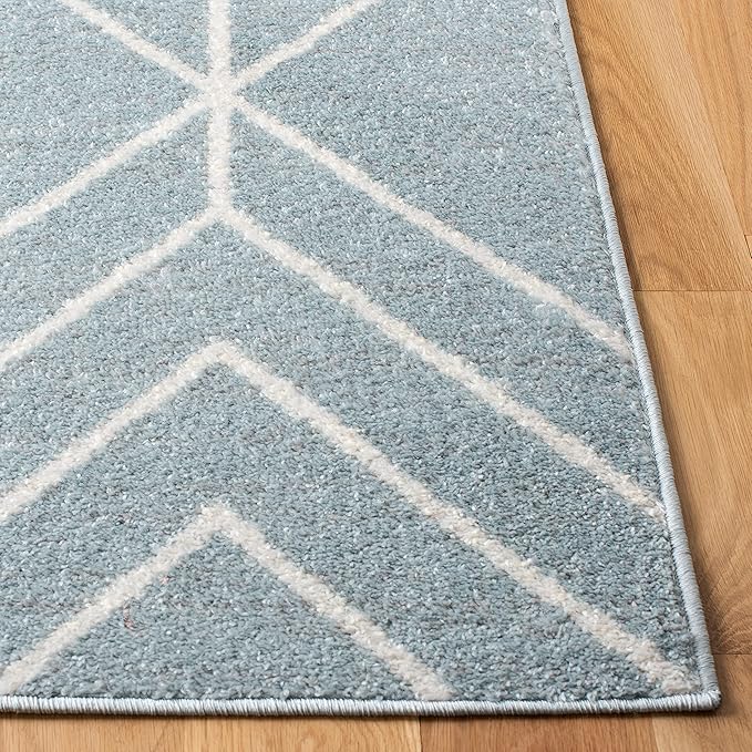SAFAVIEH Adirondack Collection Accent Rug - 4' x 6', Blue & Ivory, Modern Geometric Design, Non-Shedding & Easy Care, Ideal for High Traffic Areas in Entryway, Living Room, Bedroom (ADR241M)