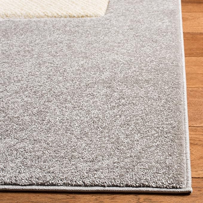 SAFAVIEH Carousel Kids Collection Area Rug - 6'7" x 9', Grey & Ivory, Elephant Design, Non-Shedding & Easy Care, Ideal for High Traffic Areas for Boys & Girls in Playroom, Nursery, Bedroom (CRK165B)