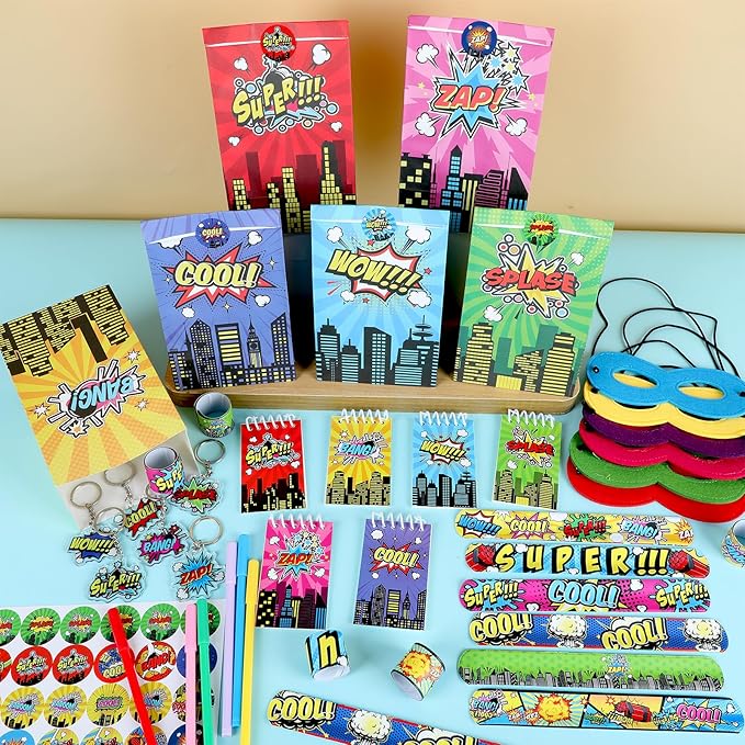 84pcs Hero Themed Super Party Favors with Colorful Paper Gift Bag Notepad Pen Slap Bracelet Key Chain Eye Mask Sticker Comic Hero Themed Party Supplies for Boy Girl Birthday Classroom Games Activities