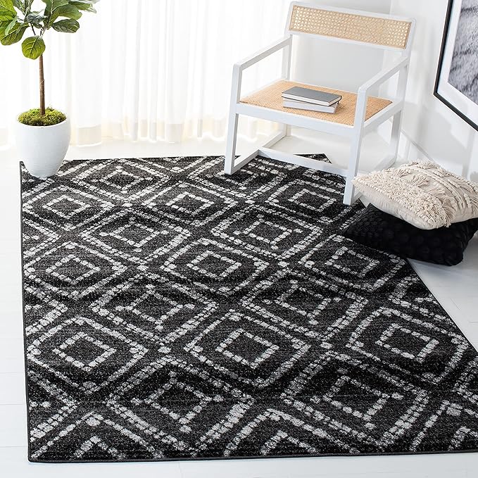 SAFAVIEH Adirondack Collection Accent Rug - 4' x 6', Black & Ivory, Modern Distressed Design, Non-Shedding & Easy Care, Ideal for High Traffic Areas in Entryway, Living Room, Bedroom (ADR131A)